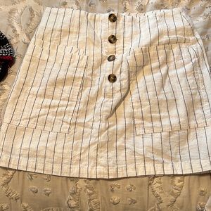 white skirt with navy blue strips